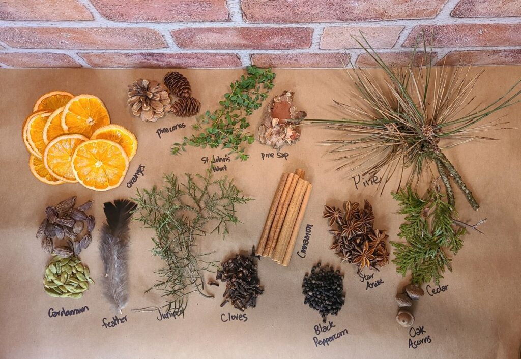 Misc nature items laid out for How To Make A Magical Yule Bag And Other Pagan Gift Ideas 