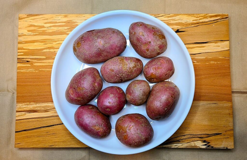 White bowl of potatoes.
