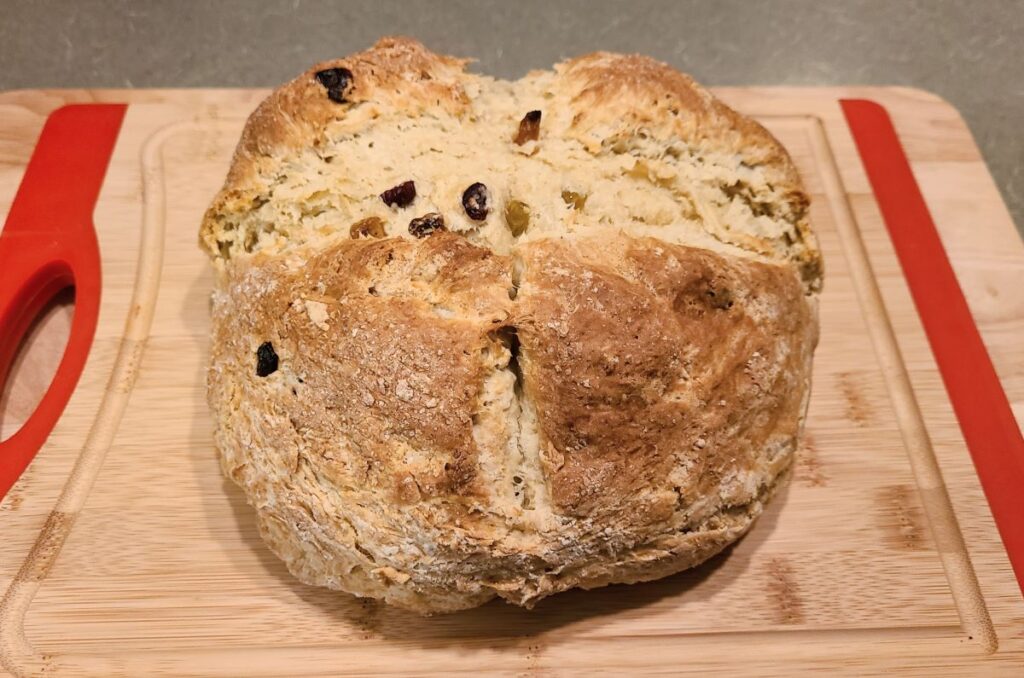 Beautiful and tall loaf of  What the best cardamon Irish soda bread tastes like.