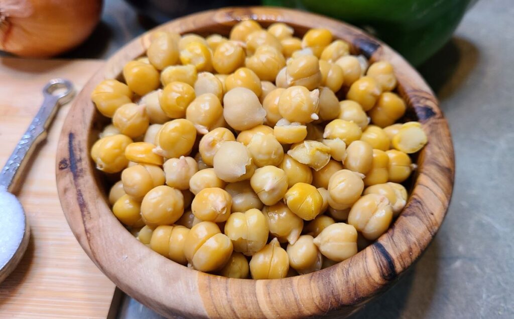 Chickpeas in a wooden bowl to add into Simple Lebanese chickpea and beef moussaka (maghmour).